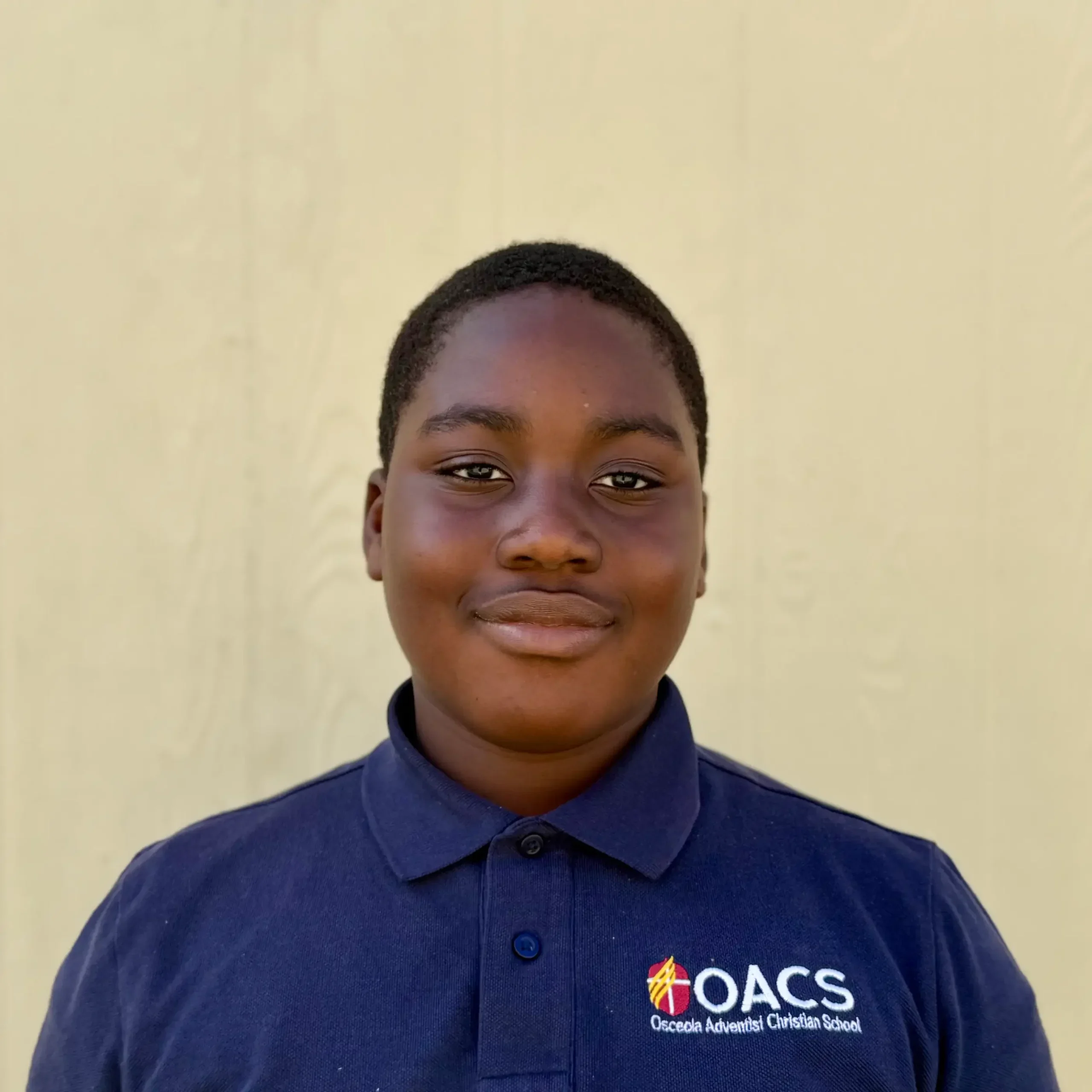 Osceola Adventist Christian School student smiling at the camera